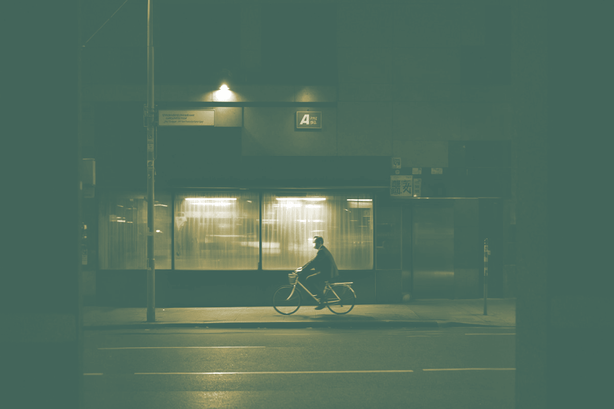 Chinese business leader on bicycle 